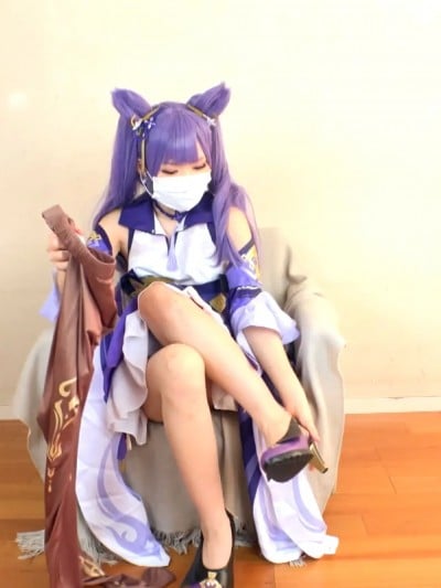 Unknown Cosplayer cosplay Keqing – Genshin Impact